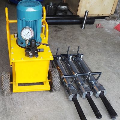 Machine hydraulique de fractionnement de pierre pour fractionner des pierres de paysage de différentes tailles