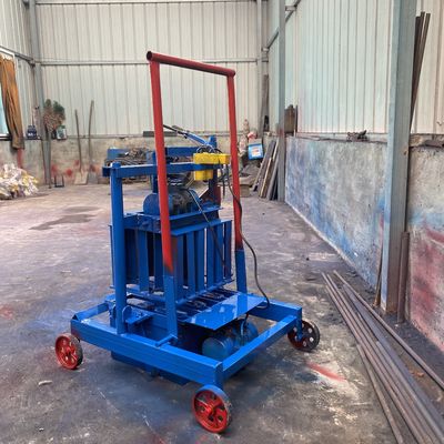 Bonne machine à faire à la main pour les briques de béton creux de bloc caractéristique de demande du client